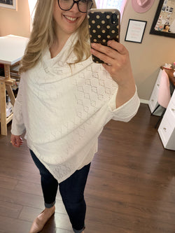 White Eyelet Market Shawl Poncho Unlike traditional shawls, this poncho features subtle sleeves to ensure a secure fit, while still offering a relaxed, flowy look. Its lightweight and stretchy fabric makes it a go-to layering piece for every season.